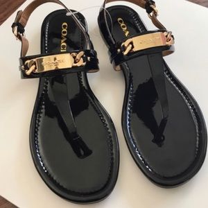 COACH women’s patten leather sandals.